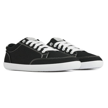 Front angle view of the FREESTYLE 3 Coal, Black sneaker with white laces on a white background
