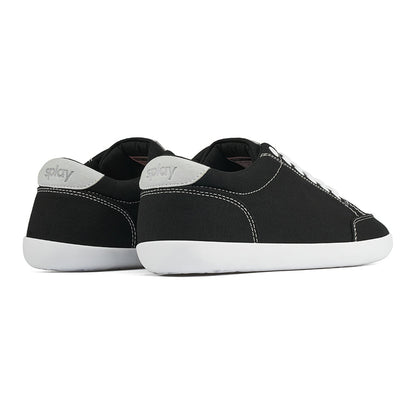 Back angle view of the FREESTYLE 3 Coal, Black sneaker with white laces on a white background. Shows details of the heel label and back panel of the shoe. 