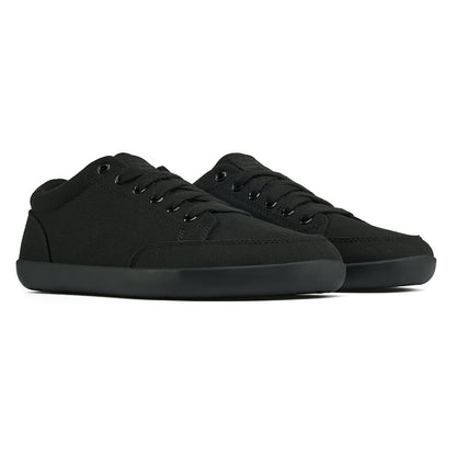 Front angle view of the FREESTYLE 3 Jet, Black sneaker with black laces, and black outsole, on a white background