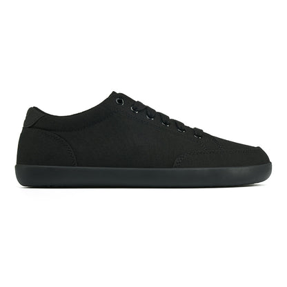 Side picture of the FREESTYLE 3 Jet, Black sneaker with black laces, and black sole on a white background
