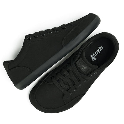 Top and Side view picture of the FREESTYLE 3 Jet, Black sneaker with black laces, and black outsole on a white background, shows black insole with the Splay logo.