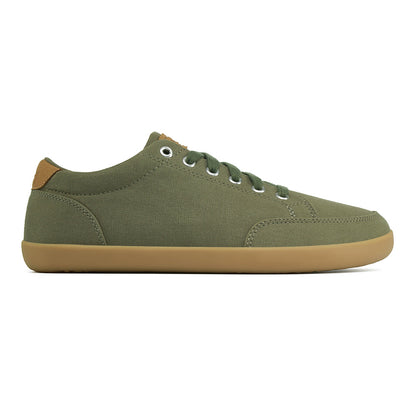 Side picture of the FREESTYLE 3 Pine, Pine green sneaker with matching green laces, and brown gumsole on a white background