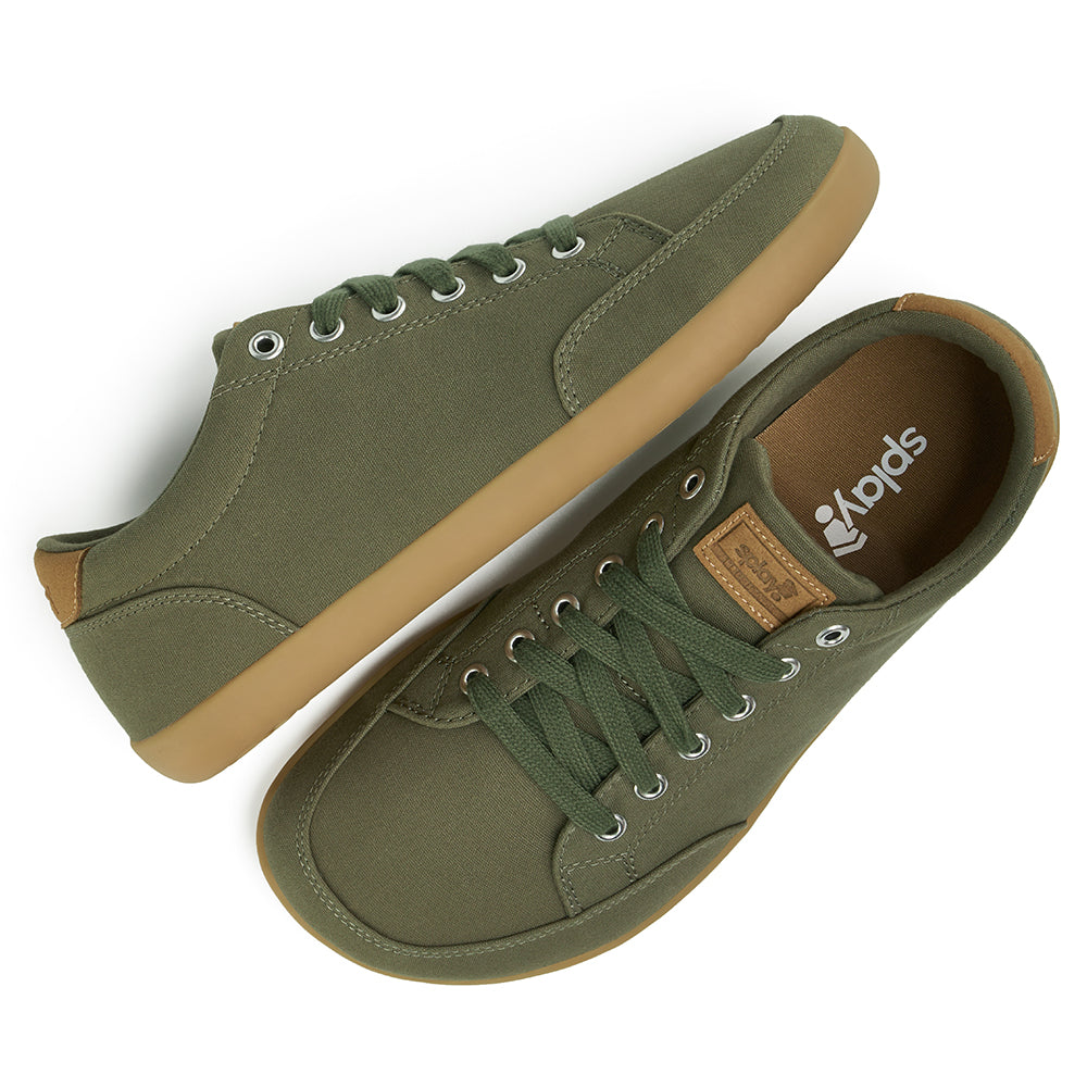 Top and Side view picture of the FREESTYLE 3 Pine, Pine green sneaker with matching green laces, and brown gumsole on a white background, shows brown insole with the Splay logo.