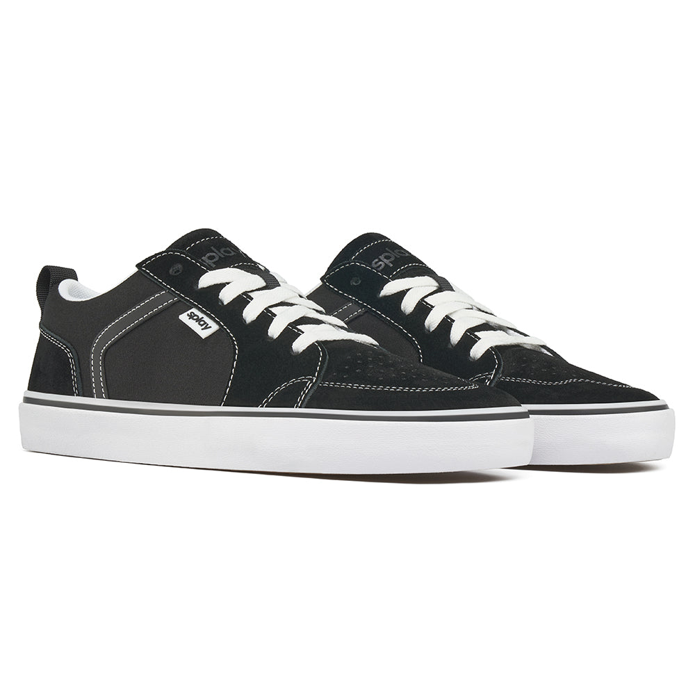 Close-up of the heel area of a black REV LTS Los Angeles sneaker showing the pull tab and white midsole detail, on a white background.